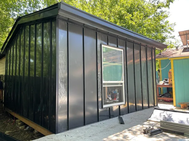 Black standing seam metal wall panels for Metal Roof Installation in Cameron